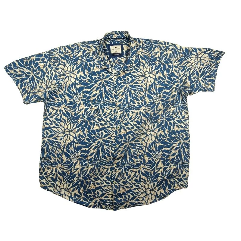 Nyári 6XL,7XL,8XL,9XL extra nagyméretű férfi rövid ujjú viszkóz ing. Bézs alapon petrol kék virág mintás, lezser stílusú.Prémium minőségű 100% viszkózból.Rendeljen online kényelmesen vagy jöjjön el személyesen üzletünkbe!2