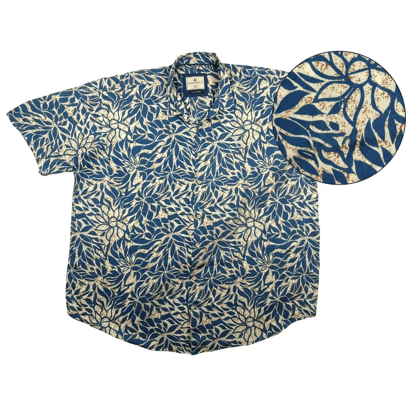 Nyári 6XL,7XL,8XL,9XL extra nagyméretű férfi rövid ujjú viszkóz ing. Bézs alapon petrol kék virág mintás, lezser stílusú.Prémium minőségű 100% viszkózból.Rendeljen online kényelmesen vagy jöjjön el személyesen üzletünkbe!